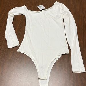 De Base long sleeve bodysuit, size medium, NWT‎